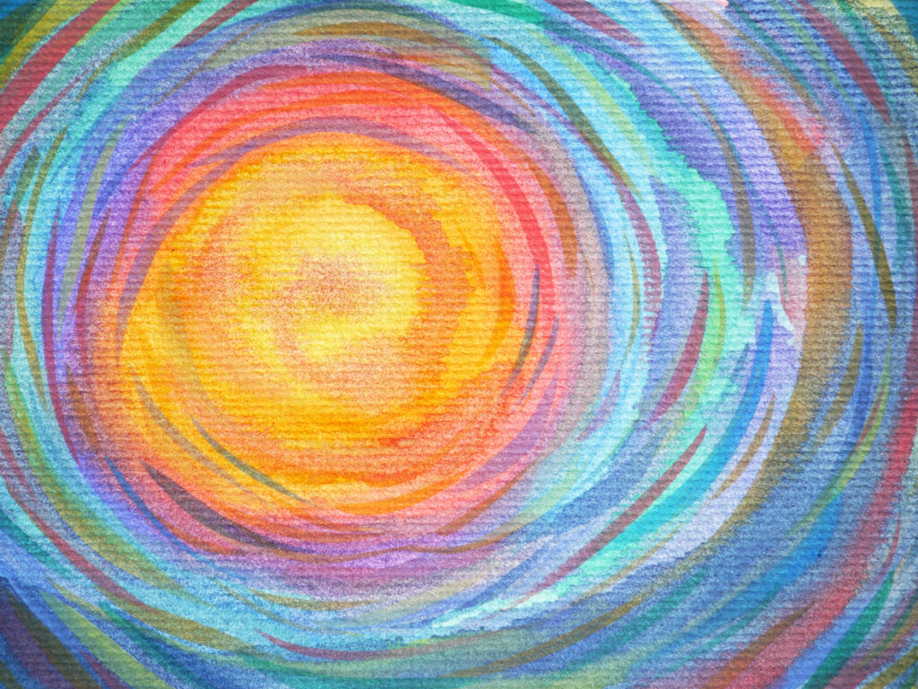 colorful spiral sun representing holistic life coaching